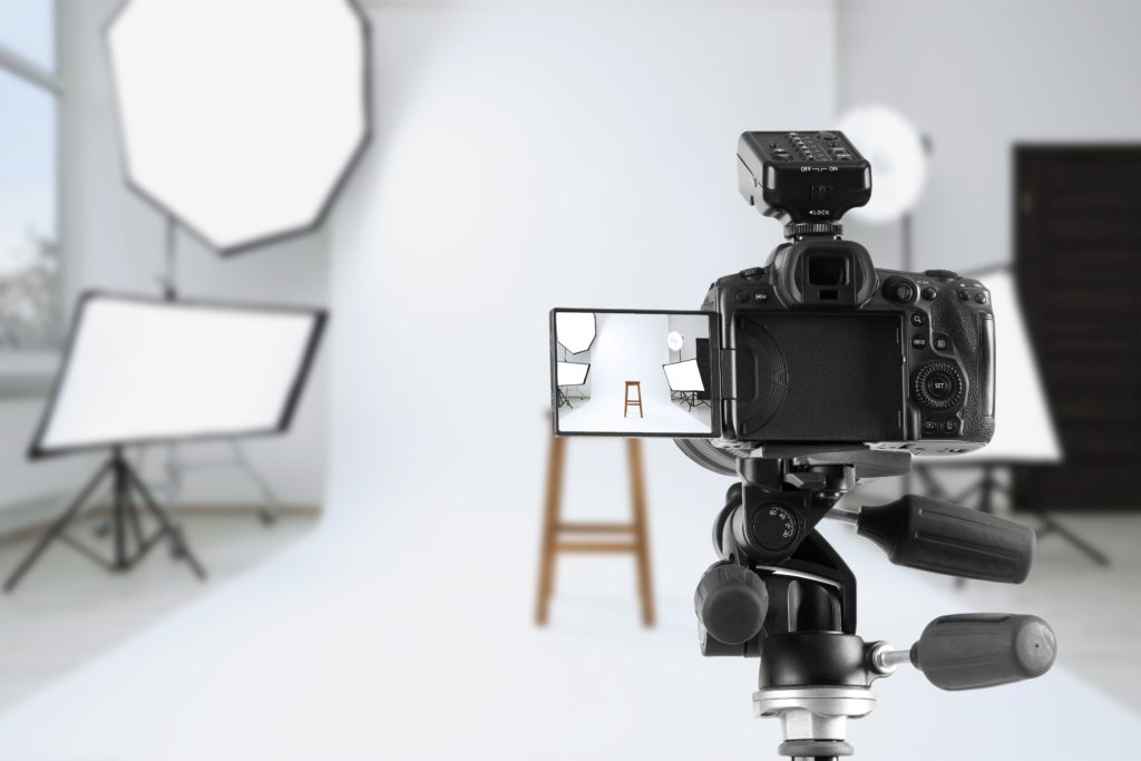 Professional,Camera,On,Tripod,In,Photo,Studio